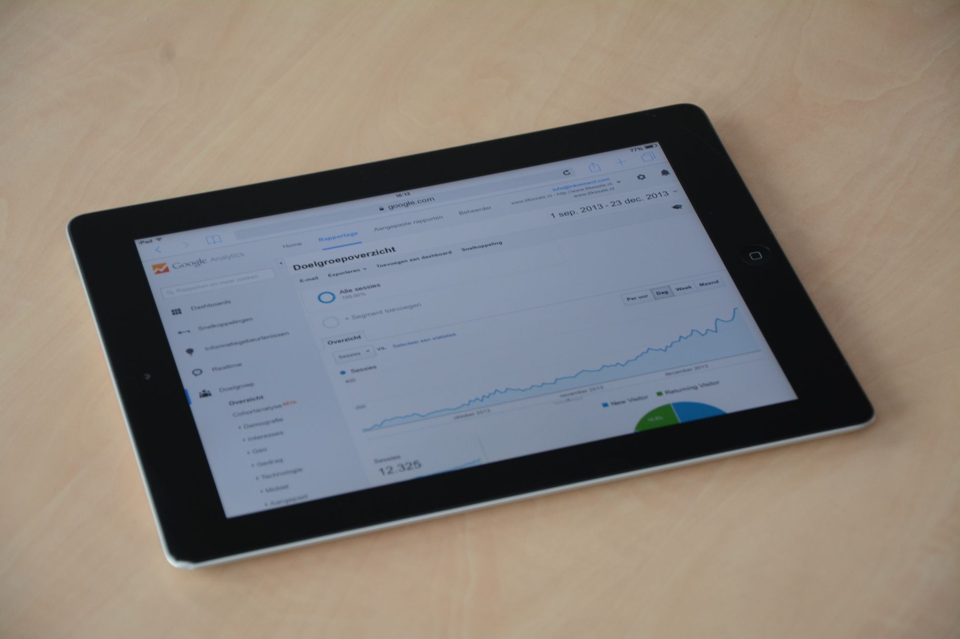 Person analyzing sales metrics on computer screen with inventory data visible