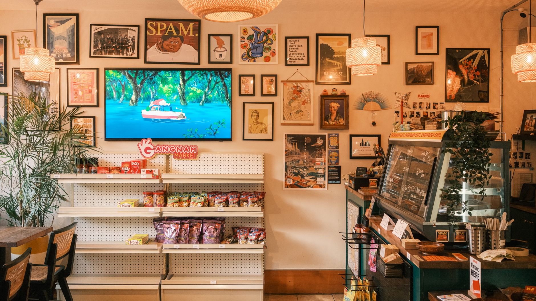 A vibrant Korean market interior featuring snacks, decor, and art pieces on display.