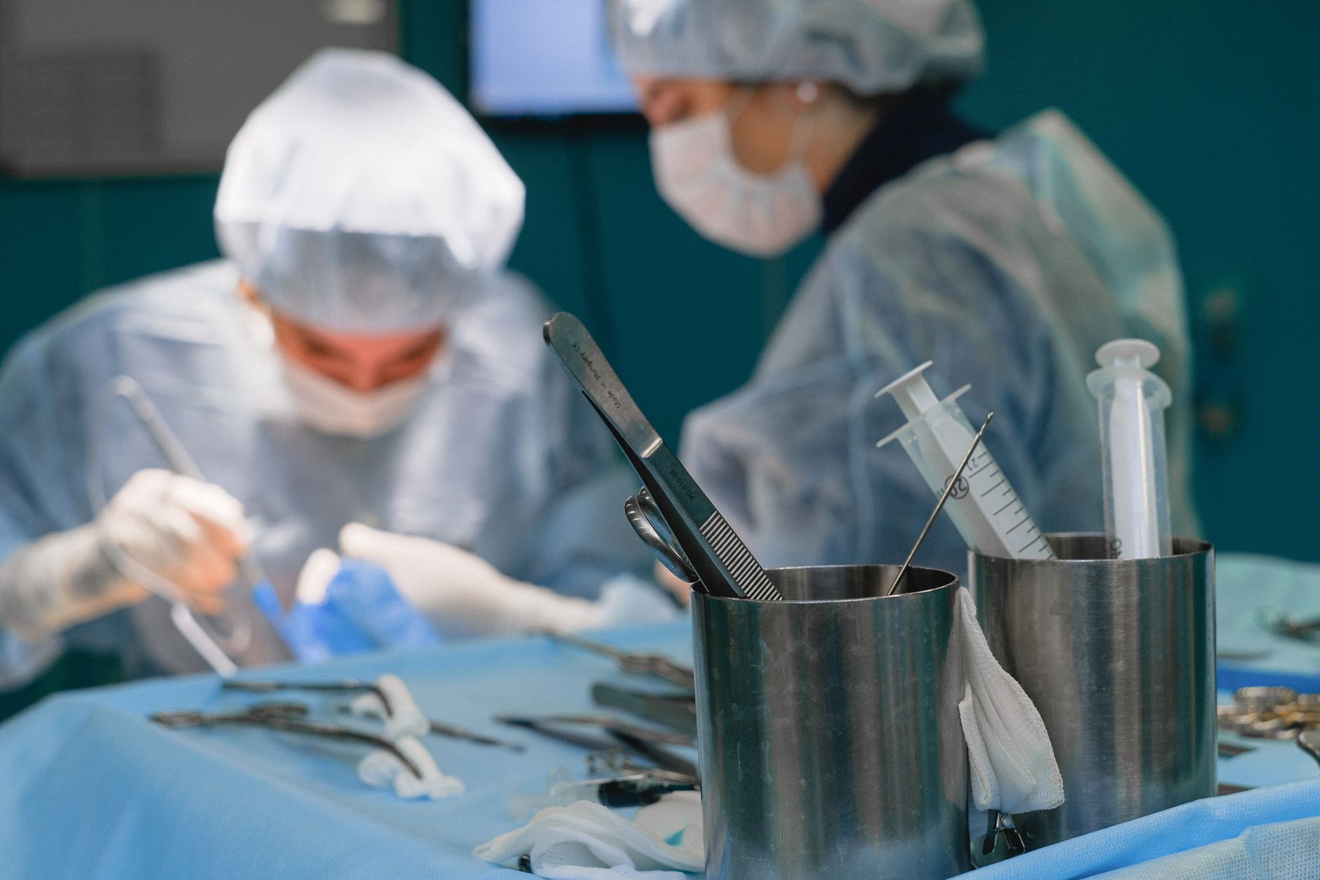 Modern surgical operating room with medical equipment and lighting for cosmetic procedures