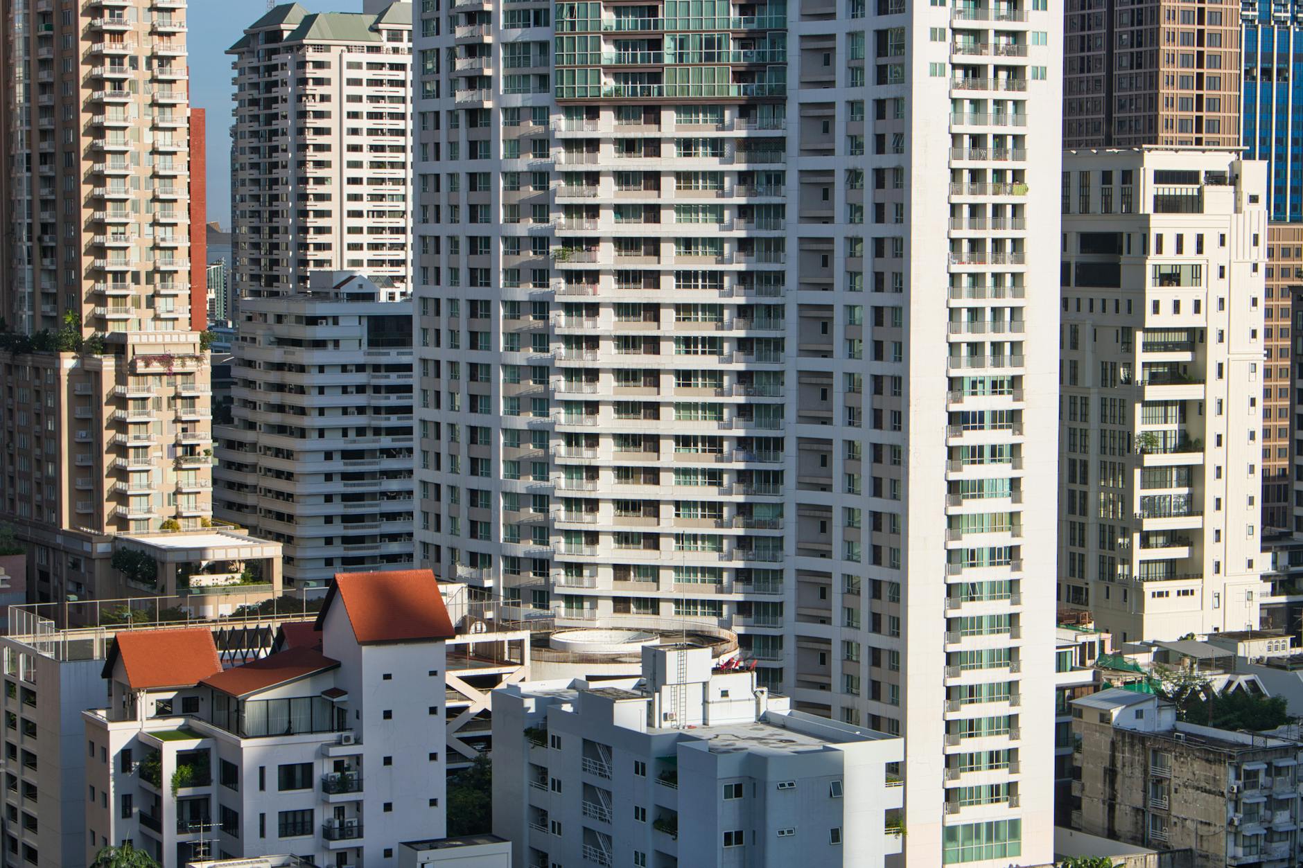 Modern Manhattan luxury condominium towers with contemporary glass architecture overlooking the cityscape