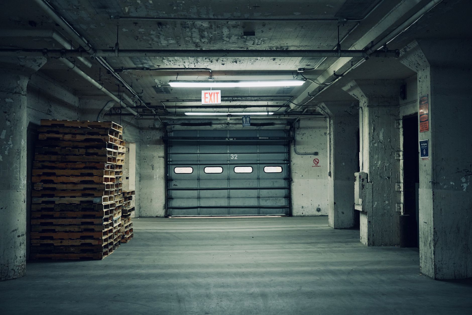 Modern industrial warehouse with loading docks and logistics operations in outer borough location